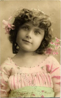 Vintage german girls dresses and hairstyle. Fancy romantic child clothing and fashion. Retro Children Costume in 1910.