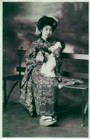 Woman with child. Traditional Japanese clothing in 1920.