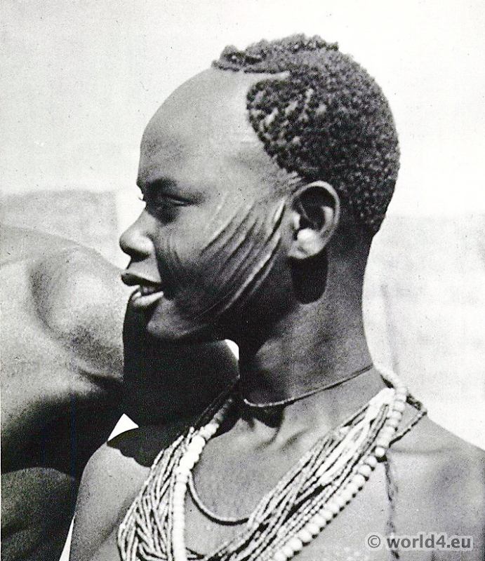 African tribe. Chad and Central African Republic. Sara girl (Sara-Madjingaye). Africa bodyart, piercing.